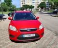 Красный Форд Фокус, объемом двигателя 1.6 л и пробегом 302 тыс. км за 6200 $, фото 1 на Automoto.ua