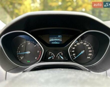 Красный Форд Фокус, объемом двигателя 1.56 л и пробегом 260 тыс. км за 7300 $, фото 6 на Automoto.ua