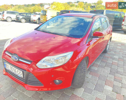 Красный Форд Фокус, объемом двигателя 1.6 л и пробегом 138 тыс. км за 7999 $, фото 1 на Automoto.ua