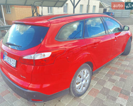 Красный Форд Фокус, объемом двигателя 1.6 л и пробегом 138 тыс. км за 7999 $, фото 4 на Automoto.ua