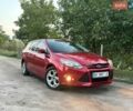 Красный Форд Фокус, объемом двигателя 1.56 л и пробегом 268 тыс. км за 8500 $, фото 1 на Automoto.ua