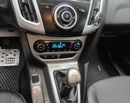 Червоний Форд Фокус, об'ємом двигуна 1.6 л та пробігом 26 тис. км за 13000 $, фото 12 на Automoto.ua