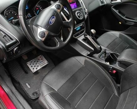 Червоний Форд Фокус, об'ємом двигуна 1.6 л та пробігом 26 тис. км за 13000 $, фото 6 на Automoto.ua