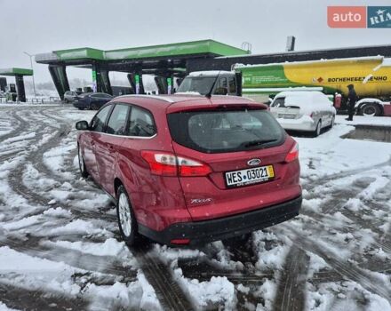 Червоний Форд Фокус, об'ємом двигуна 1.6 л та пробігом 235 тис. км за 6999 $, фото 14 на Automoto.ua