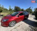 Червоний Форд Фокус, об'ємом двигуна 1.6 л та пробігом 258 тис. км за 9100 $, фото 2 на Automoto.ua