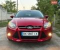 Красный Форд Фокус, объемом двигателя 1.56 л и пробегом 268 тыс. км за 8500 $, фото 1 на Automoto.ua