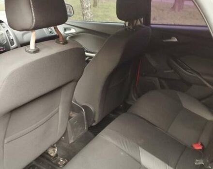 Червоний Форд Фокус, об'ємом двигуна 1 л та пробігом 215 тис. км за 4950 $, фото 4 на Automoto.ua