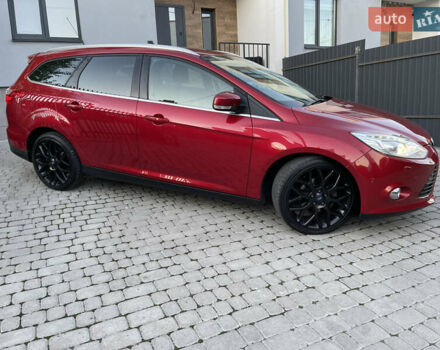 Красный Форд Фокус, объемом двигателя 1.6 л и пробегом 207 тыс. км за 8999 $, фото 1 на Automoto.ua