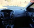 Красный Форд Фокус, объемом двигателя 1 л и пробегом 150 тыс. км за 5600 $, фото 12 на Automoto.ua