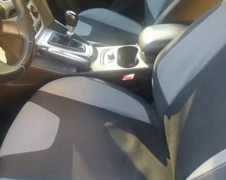 Червоний Форд Фокус, об'ємом двигуна 1.6 л та пробігом 219 тис. км за 7500 $, фото 11 на Automoto.ua