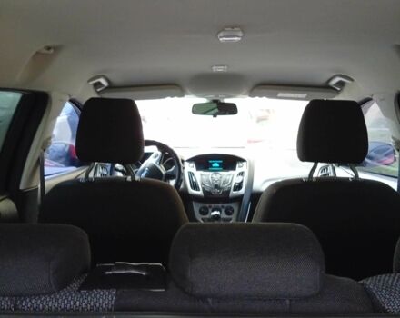 Красный Форд Фокус, объемом двигателя 1 л и пробегом 149 тыс. км за 6200 $, фото 4 на Automoto.ua