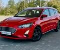 Красный Форд Фокус, объемом двигателя 1.5 л и пробегом 242 тыс. км за 12999 $, фото 1 на Automoto.ua