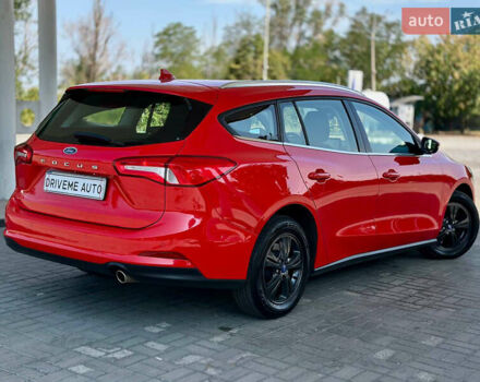 Красный Форд Фокус, объемом двигателя 1.5 л и пробегом 242 тыс. км за 12299 $, фото 4 на Automoto.ua