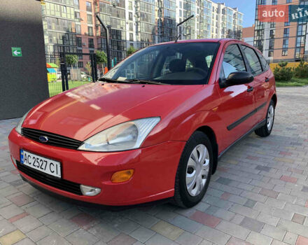 Красный Форд Фокус, объемом двигателя 1.39 л и пробегом 250 тыс. км за 2450 $, фото 1 на Automoto.ua