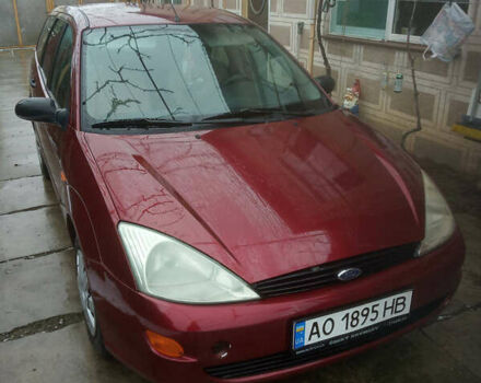 Красный Форд Фокус, объемом двигателя 1.9 л и пробегом 320 тыс. км за 2500 $, фото 1 на Automoto.ua