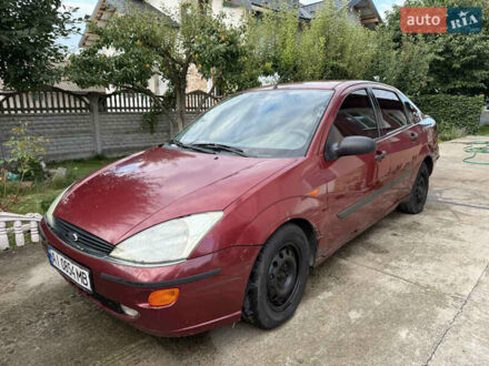 Червоний Форд Фокус, об'ємом двигуна 1.8 л та пробігом 250 тис. км за 1499 $, фото 1 на Automoto.ua