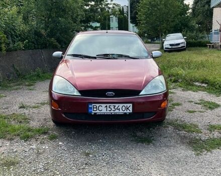 Красный Форд Фокус, объемом двигателя 2 л и пробегом 233 тыс. км за 1650 $, фото 1 на Automoto.ua