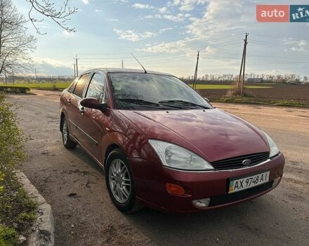 Красный Форд Фокус, объемом двигателя 2 л и пробегом 270 тыс. км за 2500 $, фото 1 на Automoto.ua