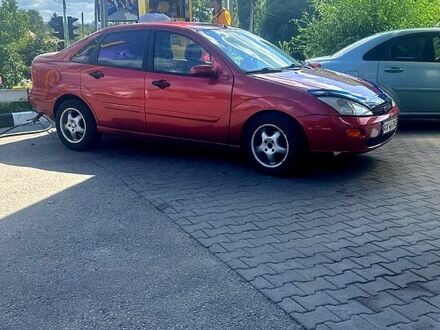 Красный Форд Фокус, объемом двигателя 2 л и пробегом 190 тыс. км за 3050 $, фото 1 на Automoto.ua