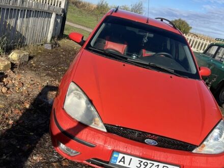 Красный Форд Фокус, объемом двигателя 1.6 л и пробегом 350 тыс. км за 2000 $, фото 1 на Automoto.ua