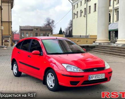 Красный Форд Фокус, объемом двигателя 1.4 л и пробегом 250 тыс. км за 2550 $, фото 1 на Automoto.ua