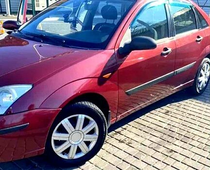 Красный Форд Фокус, объемом двигателя 1.6 л и пробегом 260 тыс. км за 2700 $, фото 1 на Automoto.ua