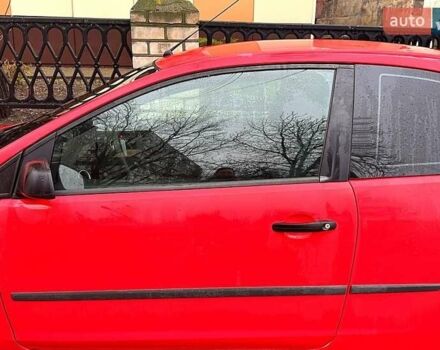 Красный Форд Фокус, объемом двигателя 1.4 л и пробегом 237 тыс. км за 3200 $, фото 1 на Automoto.ua