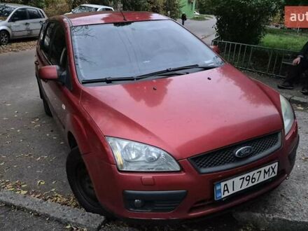 Красный Форд Фокус, объемом двигателя 1.6 л и пробегом 366 тыс. км за 4300 $, фото 1 на Automoto.ua