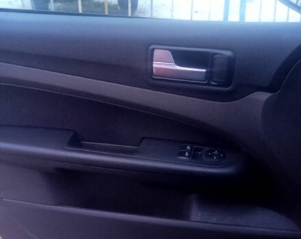 Красный Форд Фокус, объемом двигателя 1.8 л и пробегом 31700 тыс. км за 3900 $, фото 1 на Automoto.ua