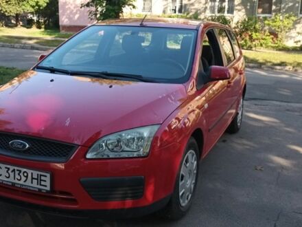 Красный Форд Фокус, объемом двигателя 1.8 л и пробегом 247 тыс. км за 4300 $, фото 1 на Automoto.ua
