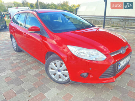 Красный Форд Фокус, объемом двигателя 1.6 л и пробегом 138 тыс. км за 7999 $, фото 1 на Automoto.ua