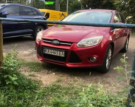 Красный Форд Фокус, объемом двигателя 2 л и пробегом 200 тыс. км за 7500 $, фото 1 на Automoto.ua