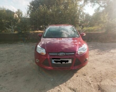 Красный Форд Фокус, объемом двигателя 2 л и пробегом 124 тыс. км за 7200 $, фото 1 на Automoto.ua
