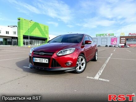 Красный Форд Фокус, объемом двигателя 2 л и пробегом 180 тыс. км за 6850 $, фото 1 на Automoto.ua