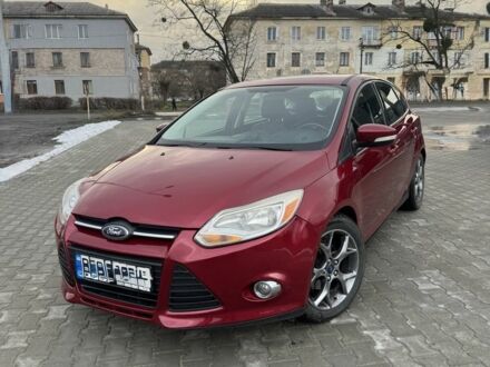 Червоний Форд Фокус, об'ємом двигуна 2 л та пробігом 171 тис. км за 8300 $, фото 1 на Automoto.ua