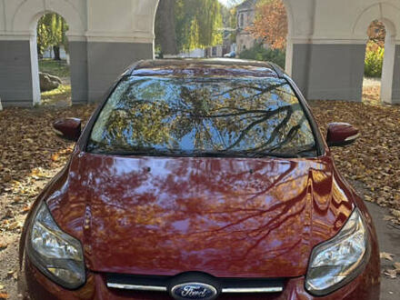 Червоний Форд Фокус, об'ємом двигуна 2 л та пробігом 138 тис. км за 7100 $, фото 1 на Automoto.ua