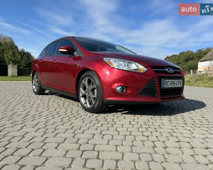 Красный Форд Фокус, объемом двигателя 2 л и пробегом 165 тыс. км за 7100 $, фото 1 на Automoto.ua