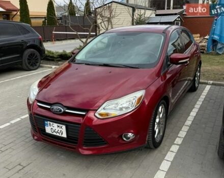 Красный Форд Фокус, объемом двигателя 2 л и пробегом 205 тыс. км за 7300 $, фото 1 на Automoto.ua