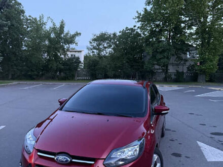 Червоний Форд Фокус, об'ємом двигуна 2 л та пробігом 220 тис. км за 9800 $, фото 1 на Automoto.ua