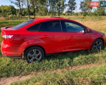 Красный Форд Фокус, объемом двигателя 2 л и пробегом 257 тыс. км за 7000 $, фото 1 на Automoto.ua