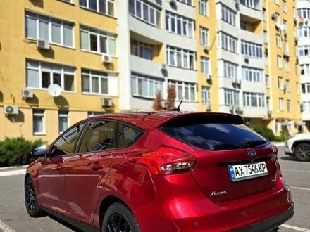 Красный Форд Фокус, объемом двигателя 2 л и пробегом 104 тыс. км за 9000 $, фото 1 на Automoto.ua