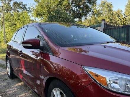 Красный Форд Фокус, объемом двигателя 2 л и пробегом 151 тыс. км за 7300 $, фото 1 на Automoto.ua
