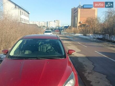 Красный Форд Фокус, объемом двигателя 2 л и пробегом 154 тыс. км за 5000 $, фото 1 на Automoto.ua