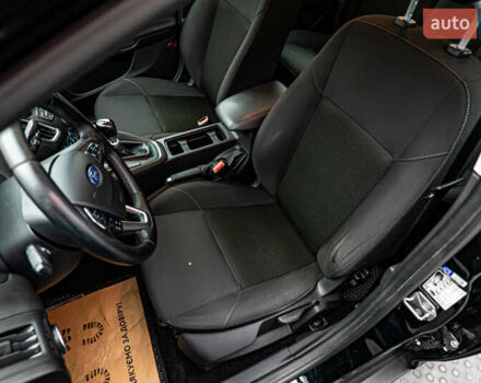 Форд Фокус, объемом двигателя 1 л и пробегом 107 тыс. км за 8016 $, фото 7 на Automoto.ua