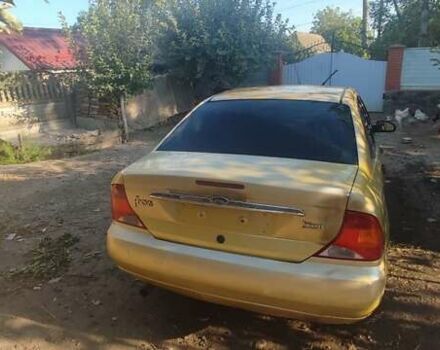 Желтый Форд Фокус, объемом двигателя 1.8 л и пробегом 325 тыс. км за 1900 $, фото 6 на Automoto.ua