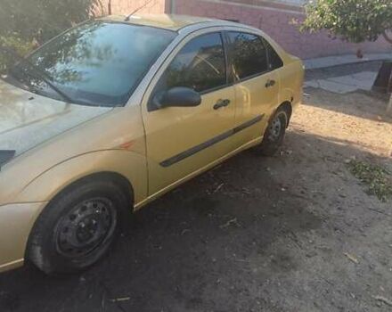 Желтый Форд Фокус, объемом двигателя 1.8 л и пробегом 325 тыс. км за 1900 $, фото 5 на Automoto.ua