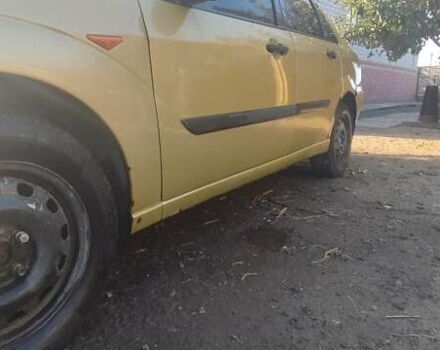 Желтый Форд Фокус, объемом двигателя 1.8 л и пробегом 325 тыс. км за 1900 $, фото 10 на Automoto.ua