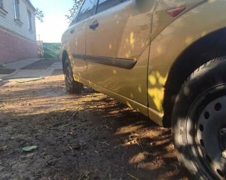 Желтый Форд Фокус, объемом двигателя 1.8 л и пробегом 325 тыс. км за 1900 $, фото 4 на Automoto.ua