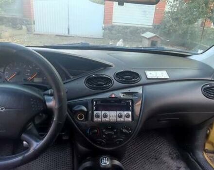 Желтый Форд Фокус, объемом двигателя 1.8 л и пробегом 325 тыс. км за 1900 $, фото 17 на Automoto.ua