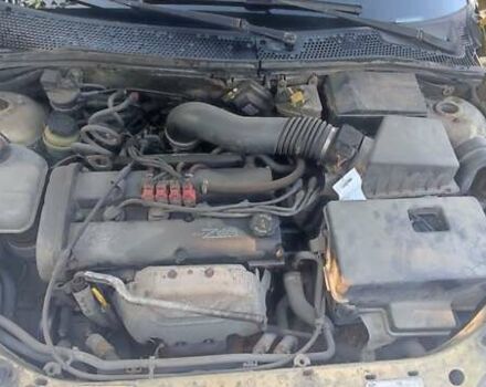 Желтый Форд Фокус, объемом двигателя 1.8 л и пробегом 325 тыс. км за 1900 $, фото 19 на Automoto.ua